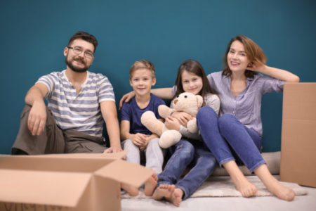 Couple sitting with boxes