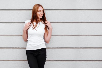 A young girl wearing a minimalistic outfit